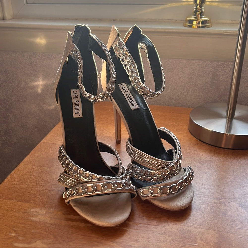 Grey stiletto heels. Worn a few times.